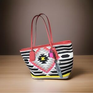 Current Carry: Coach x Coachella Dream Weaver Tote Bag w Excessive Fab Bag Bling